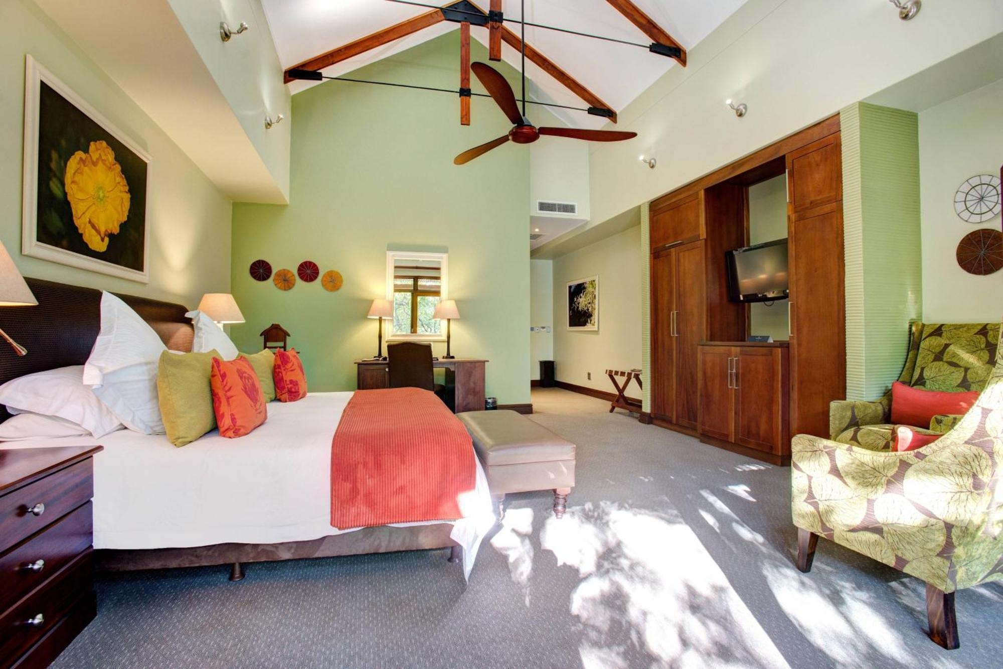 Irene Country Lodge, Autograph Collection Centurion Dış mekan fotoğraf A bedroom at the Boulders Resort